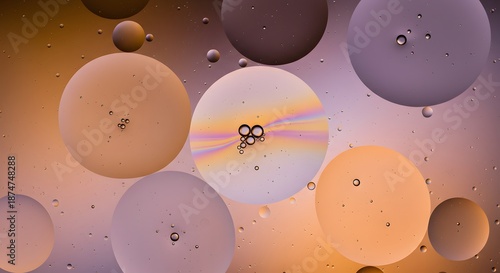 Floating spheres of varying sizes and colors create a visually striking abstract composition