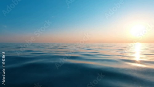Shimmering reflections on gentle ripples Mid shot, eye-level summer ocean reflections