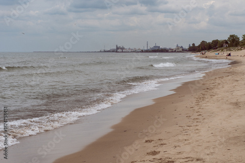 Indiana Dunes National Park along the southern shore of Lake Michigan. West Beach area, a popular beach portion of the park. Cleveland Cliffs, U.S. Steel’s Midwest Plant and Port of Indiana.