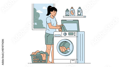 Woman doing laundry in modern laundry room with washing machine