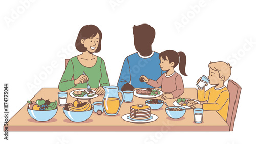 Happy family enjoying breakfast together at home
