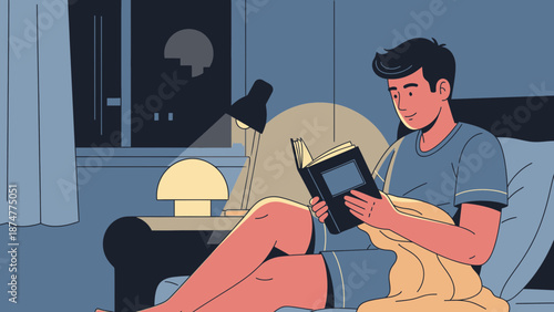 Relaxed man reading book on cozy couch in dimly lit room