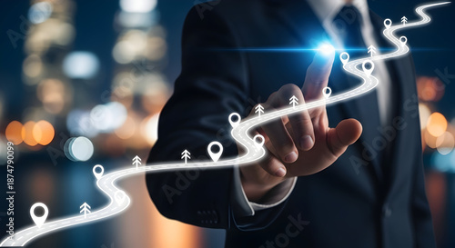 Businessman in suit tracing a glowing path forward with his finger in a modern urban setting