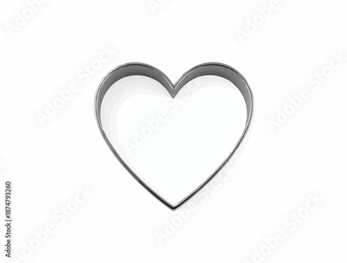 Heart-shaped cookie cutter on a white background for baking and kitchen themes