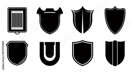 Set of eight different black shield icons with various designs and borders.