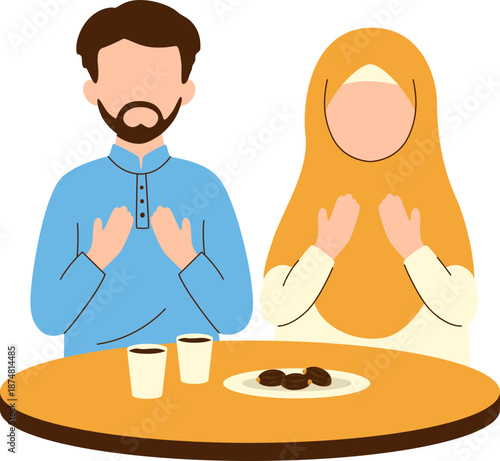 Muslim couple praying Iftar