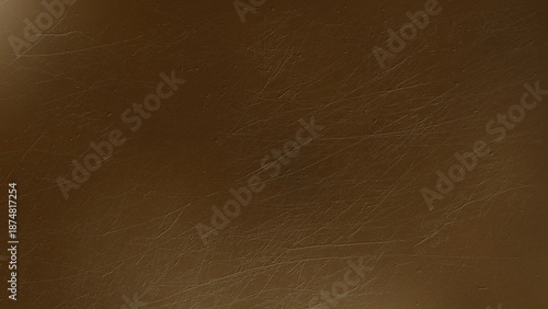 無機質な、金属や塗装されたボード・板の表面に引っかき傷や小さなクレーター・打痕などの凹凸のある傷や跡があるイメージのグランジ系の画像素材　背景・テクスチャー　16:9・8K UHDサイズ（7680 x 4320）　銅・カッパー・ブロンズ・ダークゴールド