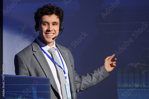 Male business speaker in he...