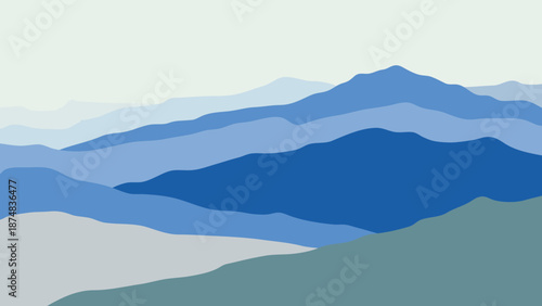 A blue mountain range with a white sky in the background