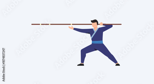 Man in martial arts stance with staff