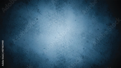 A blue and black background with a white light in center