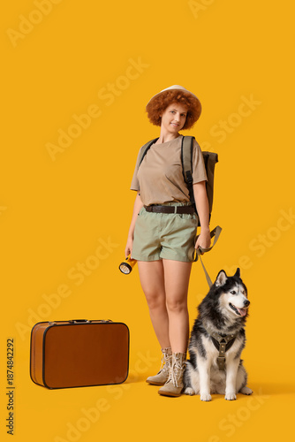 Female traveler with Husky ...