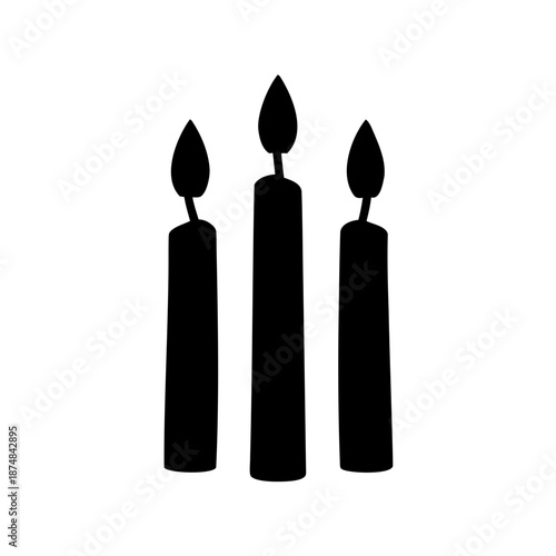 Silhouette of three lit candles, symbol of celebration or remembrance