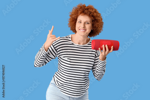 Young redhead woman with po...
