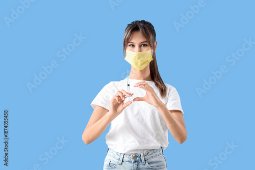 Young woman in medical mask...