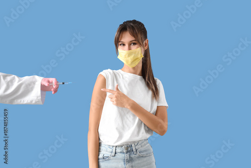 Young woman in medical mask...
