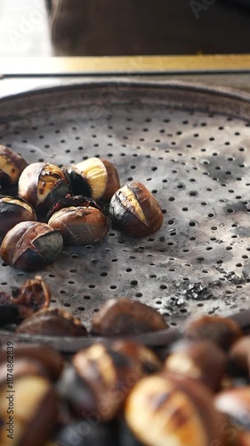 Chestnuts being roasted on street food stand