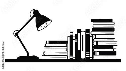 a black and white image of a desk lamp and stacks of books