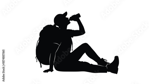 a person sitting on the ground taking a photo with a camera