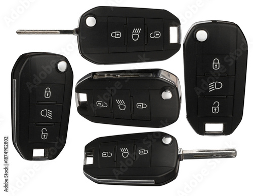 Foto collection of five modern car key fobs with remote control buttons, presented from various angles against a transparent background for automotive services
