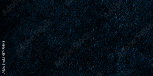 Dark blue grunge concrete aged vintage structure studio scratch backdrop background.