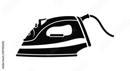 A striking black and white image of a classic clothing iron in silhouette