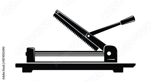 A black and white depiction of a tile cutter tool in a striking silhouette