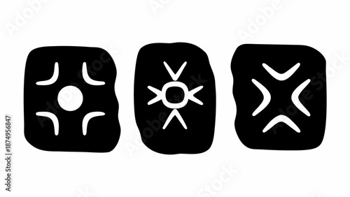 Ancient symbols on black stones with white designs