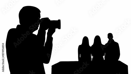 Photographer capturing candid moment with group of people