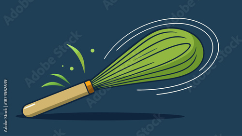 A green whisk is shown with a brown handle. The whisk is spinning and has a green handle