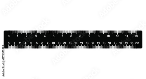 A black ruler displaying metric and imperial units against a stark white background silhouette