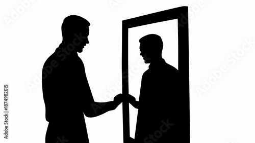 Man interacting with mirror reflection in black silhouette