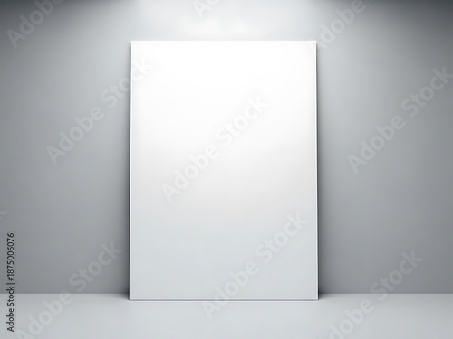 A blank white vertical poster mockup featuring realistic window sunlight shadows on a minimalist gray wall for professional designs