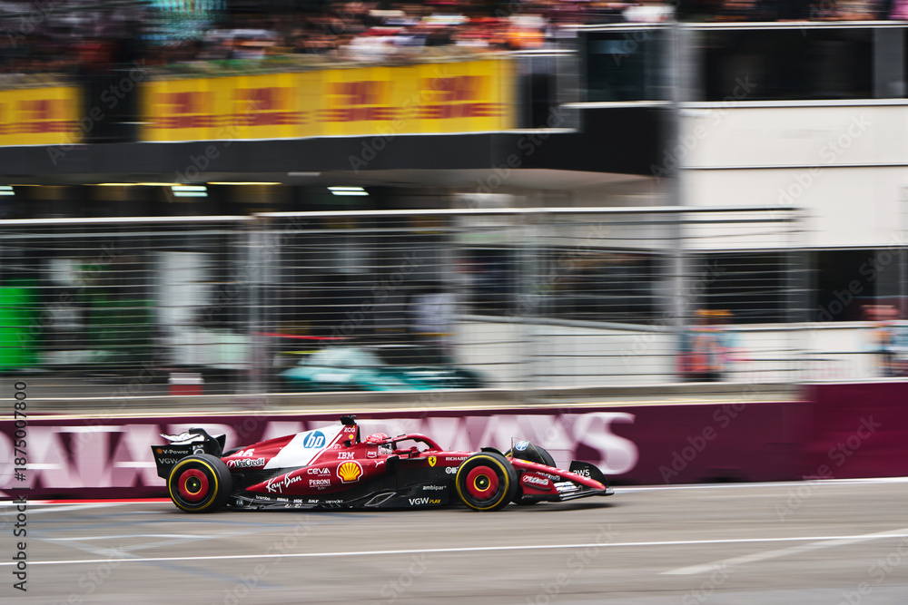 Fototapeta premium BAKU, AZERBAIJAN - SEPTEMBER 21, 2025: Charles Leclerc drives the Scuderia Ferrari HP SF-25 during the Formula 1 Azerbaijan Grand Prix at Baku City Circuit
