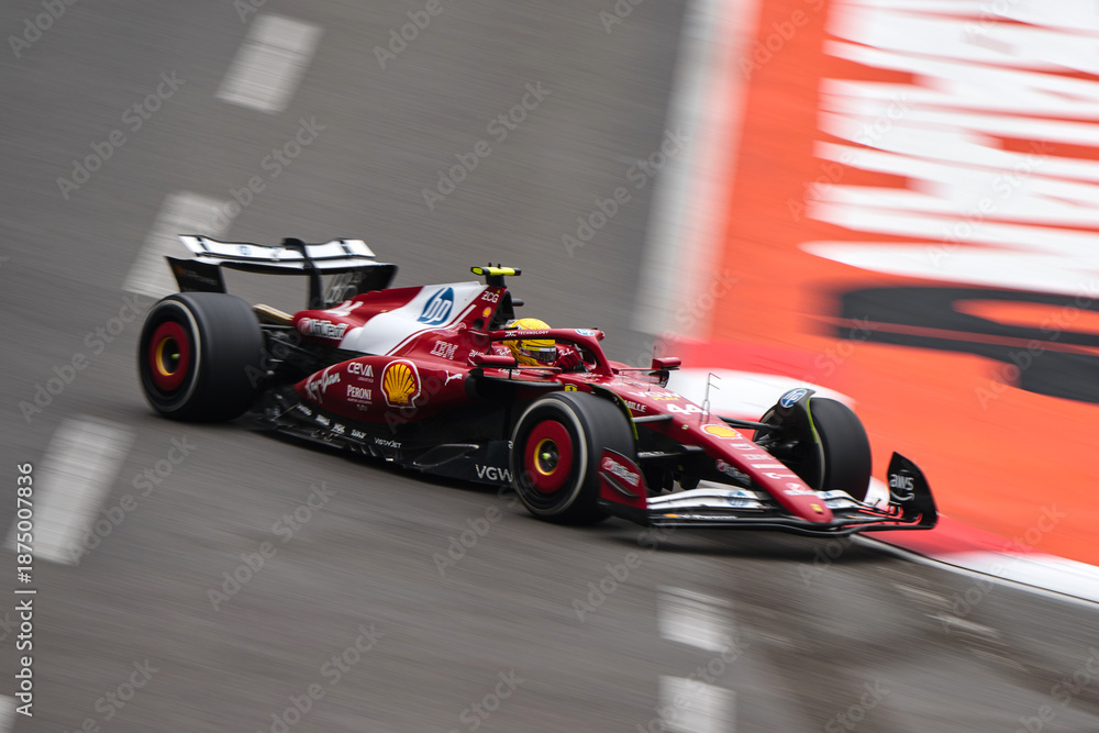 Naklejka premium BAKU, AZERBAIJAN - SEPTEMBER 21, 2025: Lewis Hamilton pilots the Scuderia Ferrari HP SF-25 during the Formula 1 Azerbaijan Grand Prix at Baku City Circuit