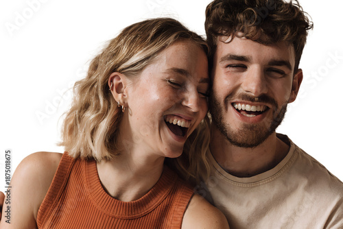 Happy young couple smiling together in a romantic portrait