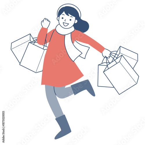 多数のショッピングバッグを持って歩く若い女性