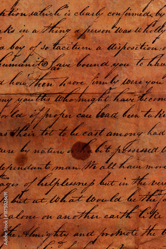 Handwriting on an antique letter written on grunge paper. Old calligraphy handwriting background backdrop.