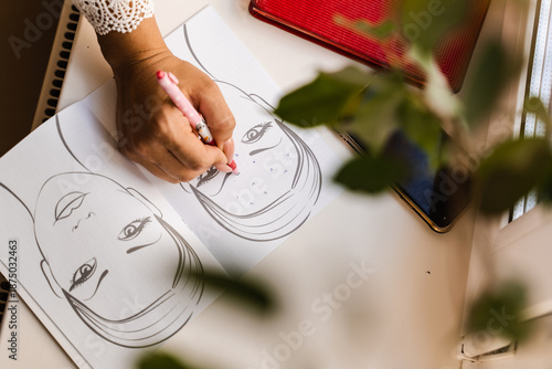 Bild auf Leinwand Mapping facial mimic zones on patient chart during cosmetic consultation