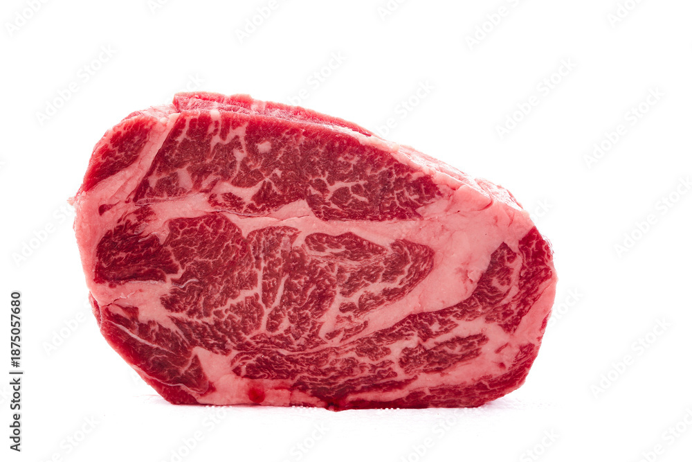 Obraz premium Premium Raw Ribeye Steak with Marbling Isolated on White Background for Culinary Photography