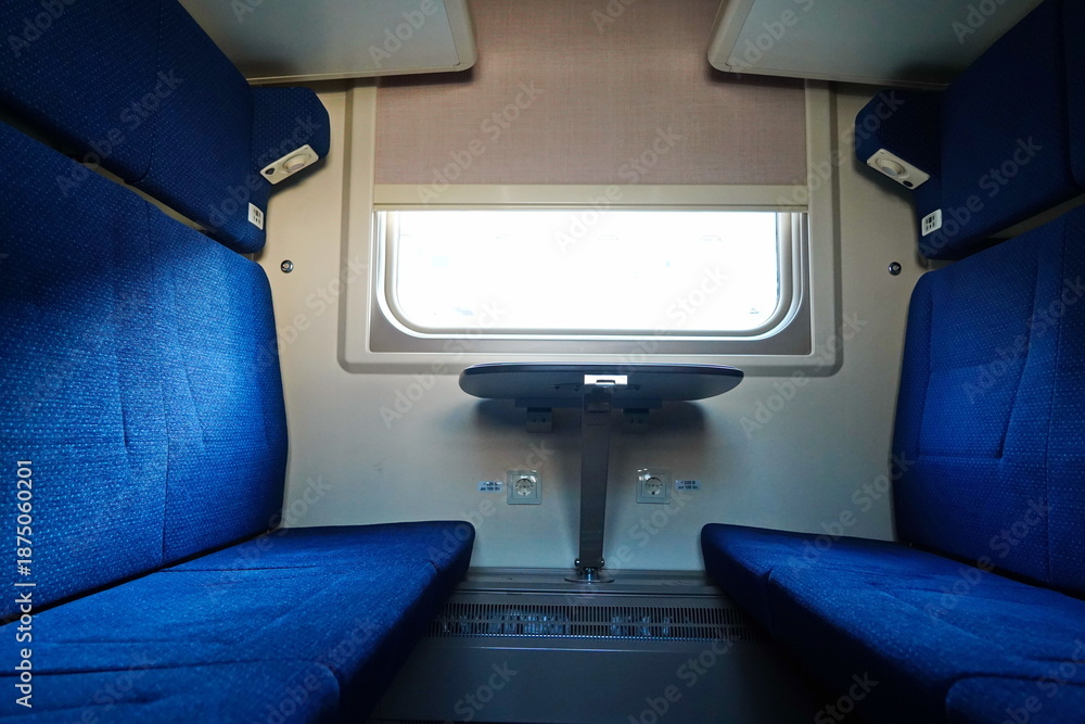 Fototapeta premium Almaty, Kazakhstan - 11.30.2025 : Sitting in a passenger train compartment.