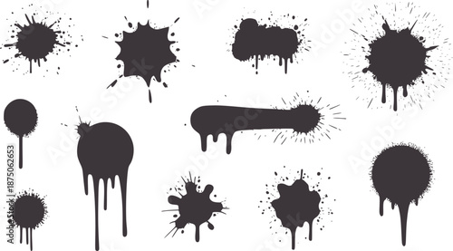 Collection of dark gray paint splatters and drips stain