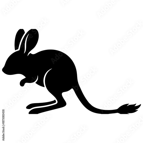 A kangaroo is hopping in the Australian outback landscape viewed from the side.