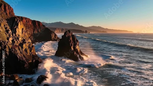 Rocky Coastline with Waves Crashing at Sunset