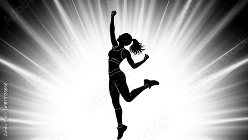 Dynamic silhouette of a woman dancing freely in a radiant light burst