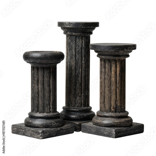 Three weathered stone pillars on black background