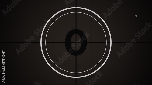 5 seconds short old movie countdown with vintage film leader aesthetics, featuring flicker, grain, dust and scratches. Ideal for quick transitions, cuts, and retro video edits.