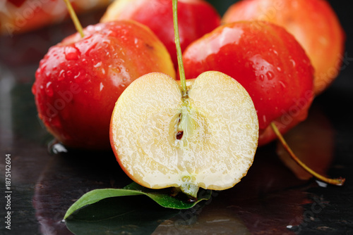 Fresh Red Apples Cut in Half with Water Droplets