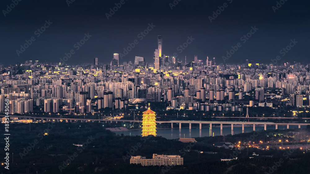 Obraz premium Illuminated Pagoda and Bridge with Modern Skyscrapers at Twilight Panoramic Cityscape