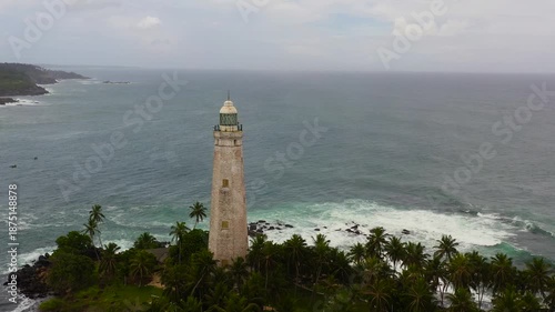 Wallpaper Mural Seascape: Lighthouse and blue ocean with big waves and surf. Dondra, Matara, Sri Lanka. Torontodigital.ca